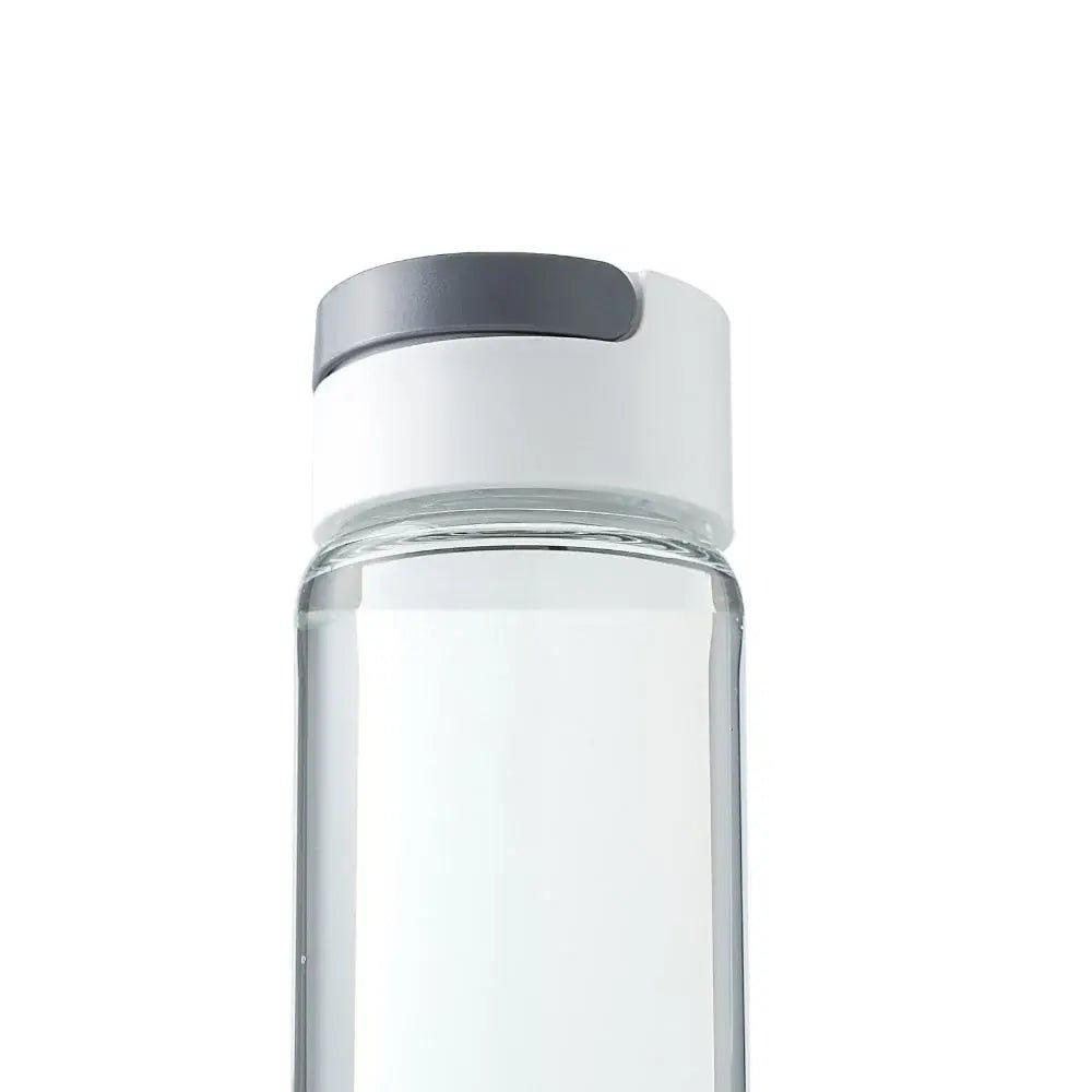 Pro Hydrogen Water Bottle by Hydro Fever on an office desk, combining style and health-enhancing hydration technology.